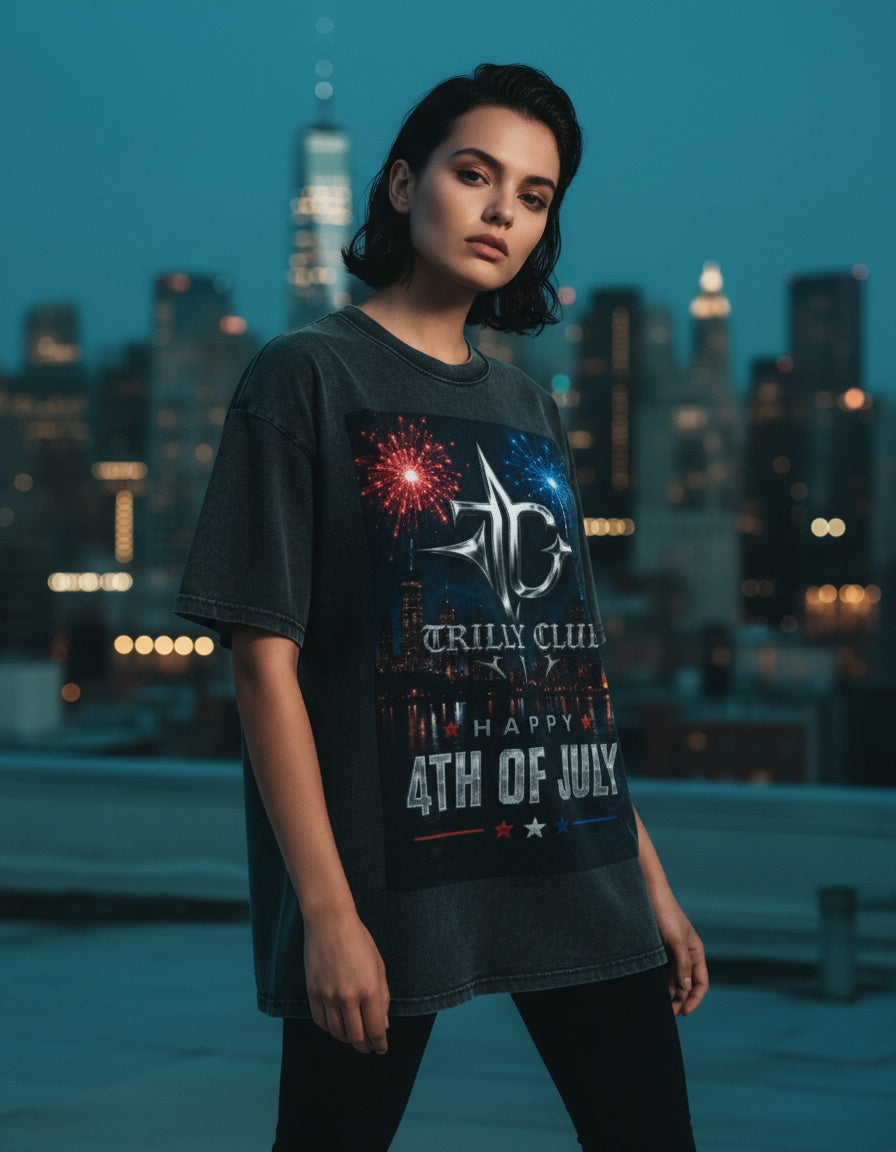 TRILLY CLUB - 4th of July outfit ideas, fireworks tee against the city skyline